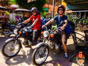 Heading on a motorbike trip Crossing The Border With A Motorbike Between Laos And Cambodia
